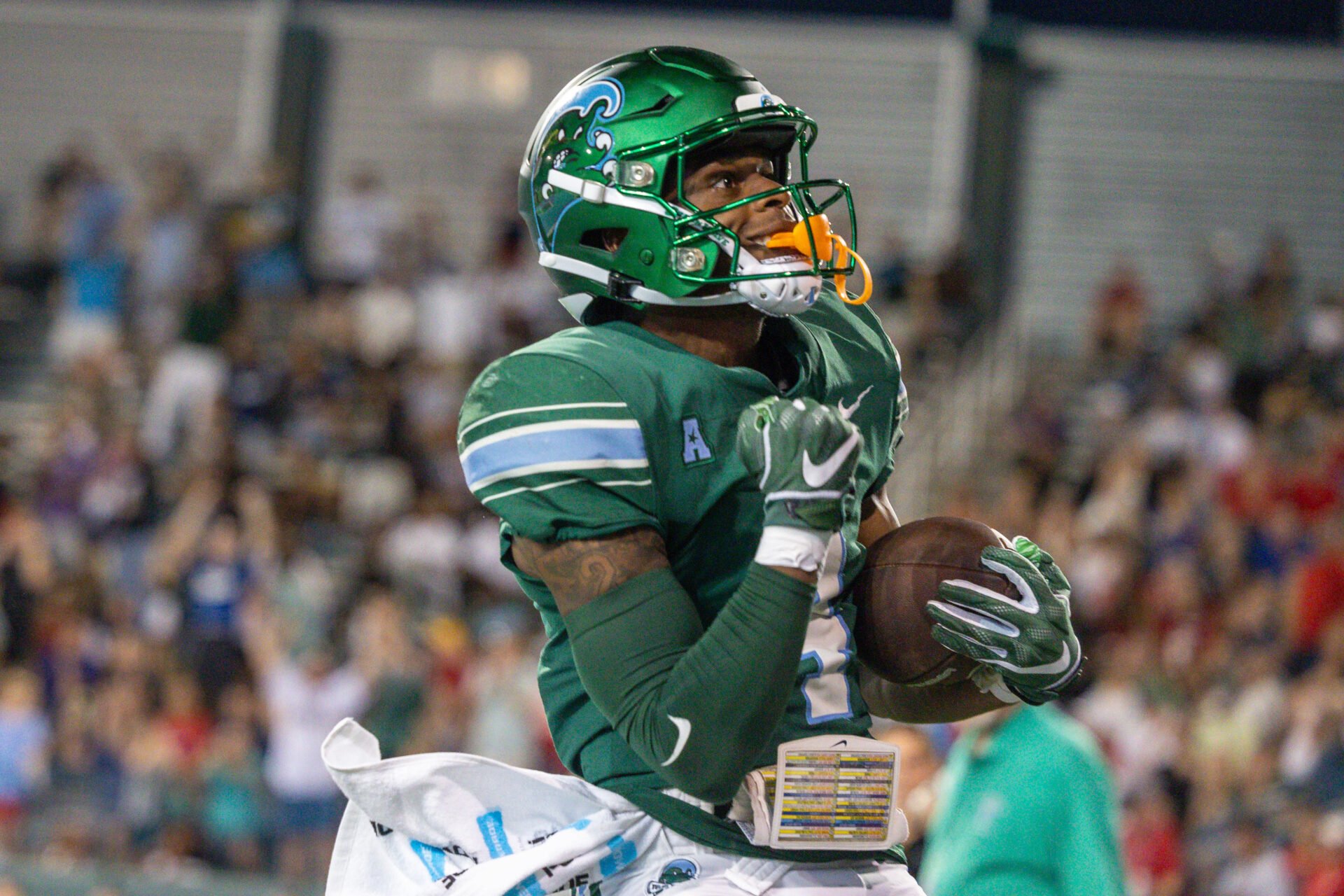 Tulane Green Wave wide receiver Jha'Quan Jackson (4) reacts to scoring a touchdown against the South Alabama Jaguars during the first half at Yulman Stadium.