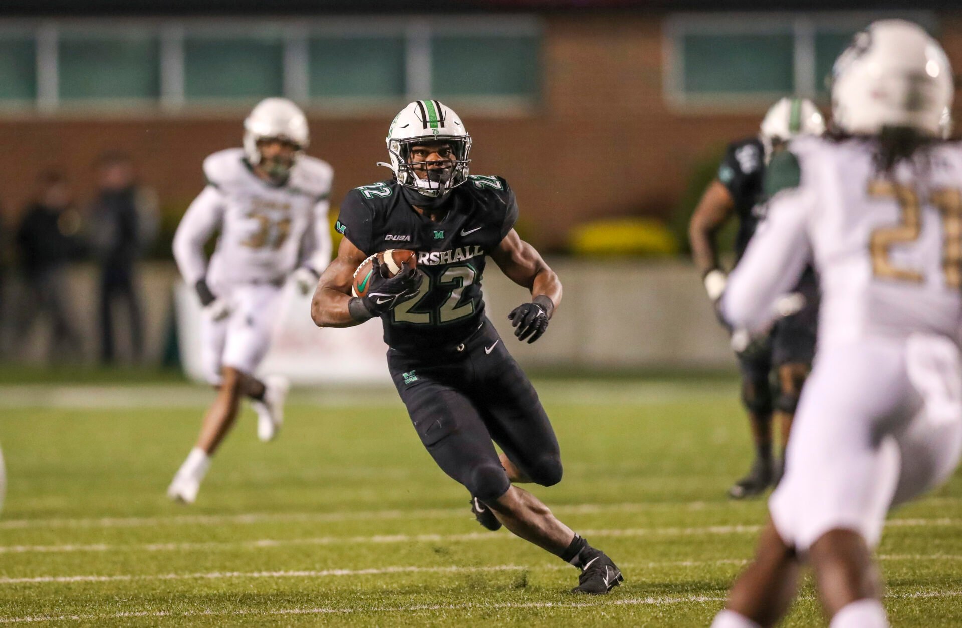 Marshall Thundering Herd running back Rasheen Ali (22) runs the ball after a catch against the UAB Blazers during the third quarter at Joan C. Edwards Stadium.
