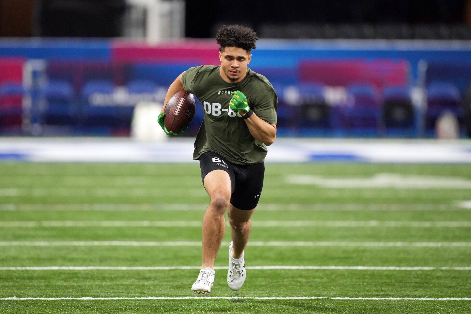 Oregon defensive back Evan Williams (DB66) works out during the 2024 NFL Combine at Lucas Oil Stadium.