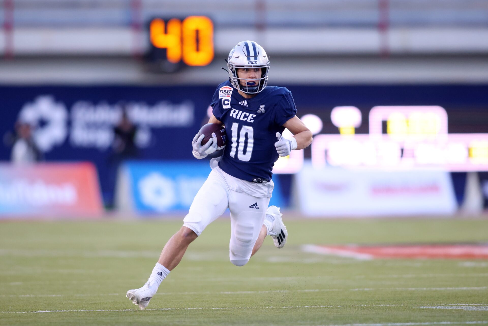 Rice Owls wide receiver Luke McCaffrey (10) runs with the ball against the Texas State Bobcats in the first quarter at Gerald J Ford Stadium. Mandatory Credit: Tim Heitman-USA TODAY Sports