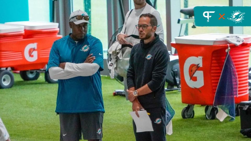 Miami Dolphins general manager Chris Grier and head coach Mike McDaniel watch training camp at Baptist Health Training Complex, Friday, July 28, 2023 in Miami Gardens.