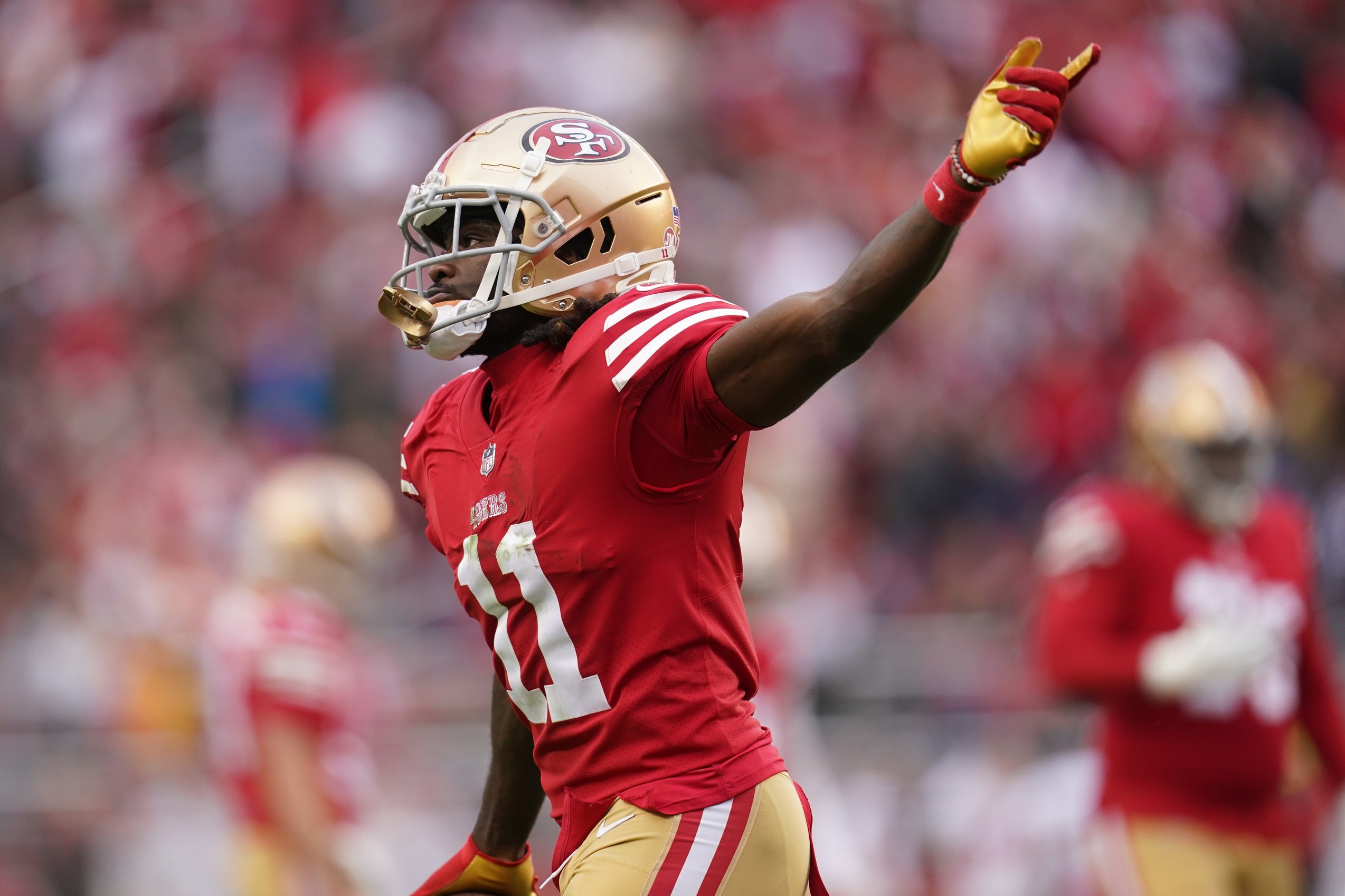 San Francisco 49ers wide receiver Brandon Aiyuk (11) celebrates after catching a touchdown pass against the Tampa Bay Buccaneers in the second quarter at Levi's Stadium. Mandatory Credit: Cary Edmondson-USA TODAY Sports