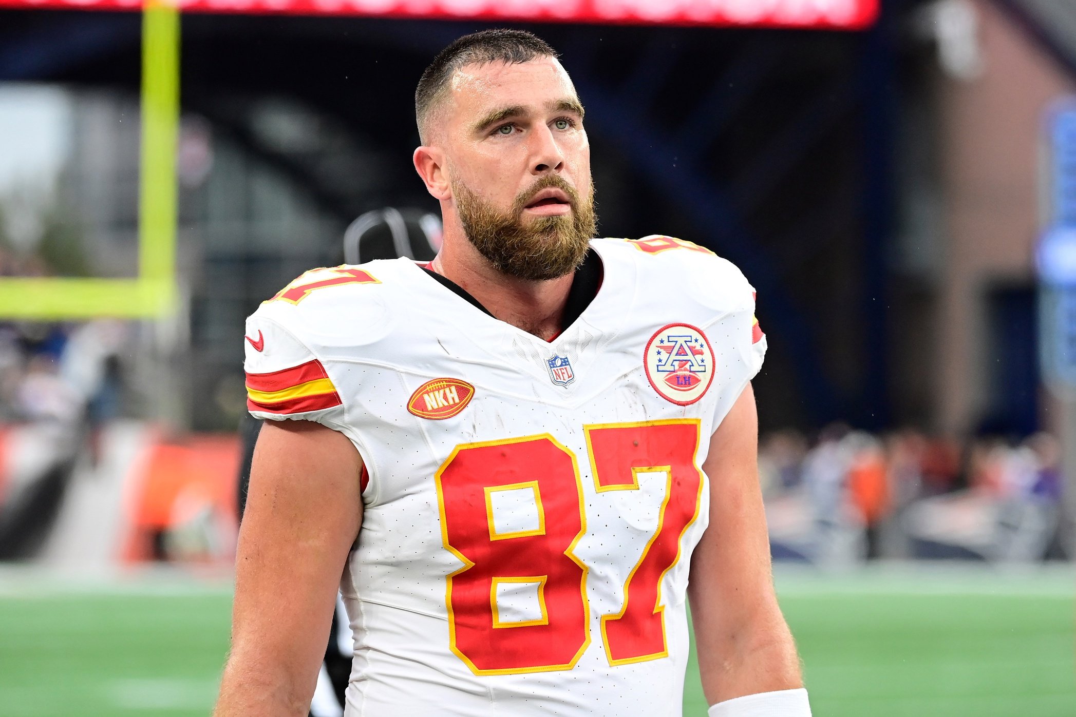 Dec 17, 2023; Foxborough, Massachusetts, USA; Kansas City Chiefs tight end Travis Kelce (87) watches from the sideline during the second half against the New England Patriots at Gillette Stadium. Mandatory Credit: Eric Canha-USA TODAY Sports