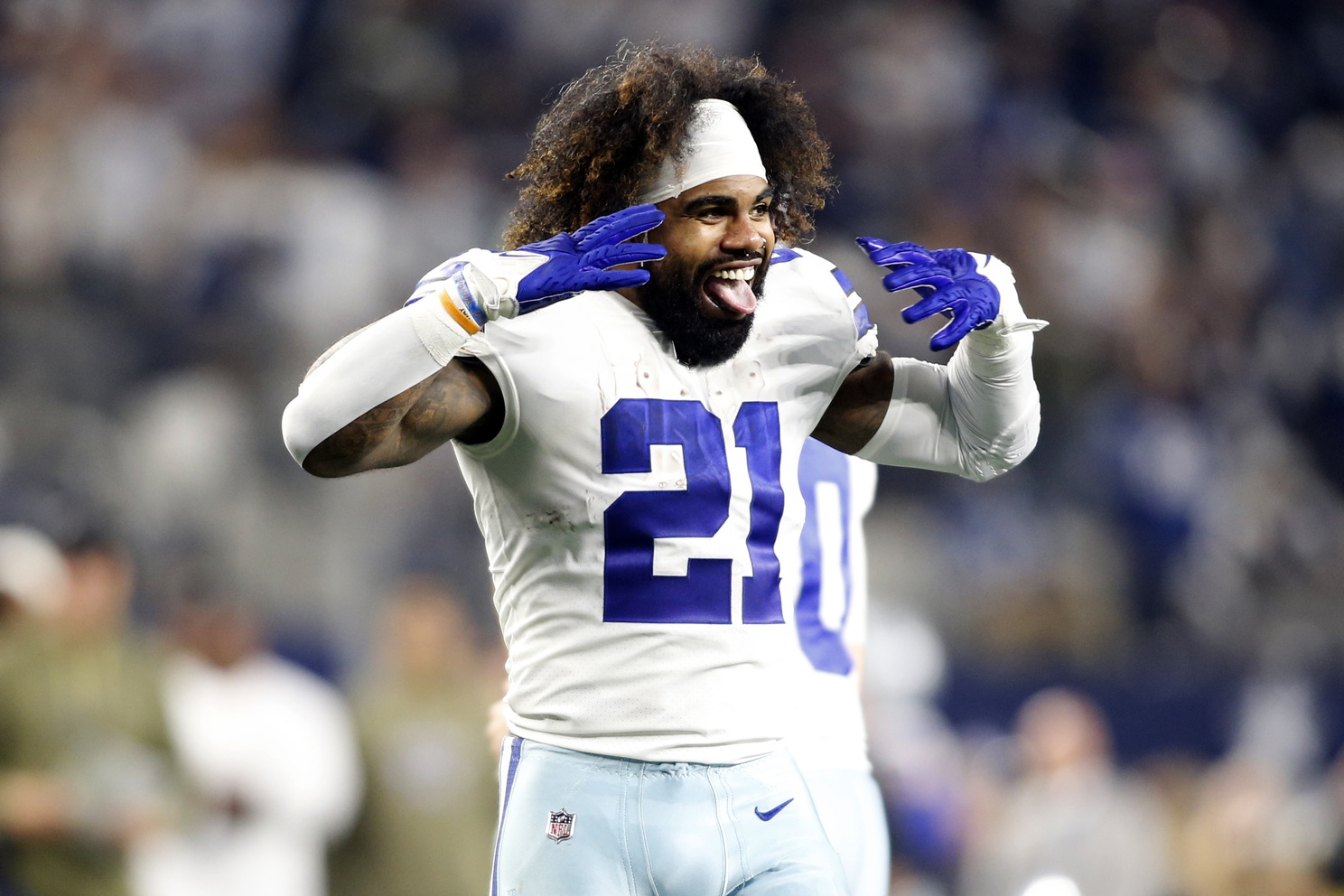 Dallas Cowboys running back Ezekiel Elliott (21) celebrates a touchdown in the fourth quarter against the Indianapolis Colts at AT&T Stadium. Mandatory Credit: Tim Heitman-USA TODAY Sports