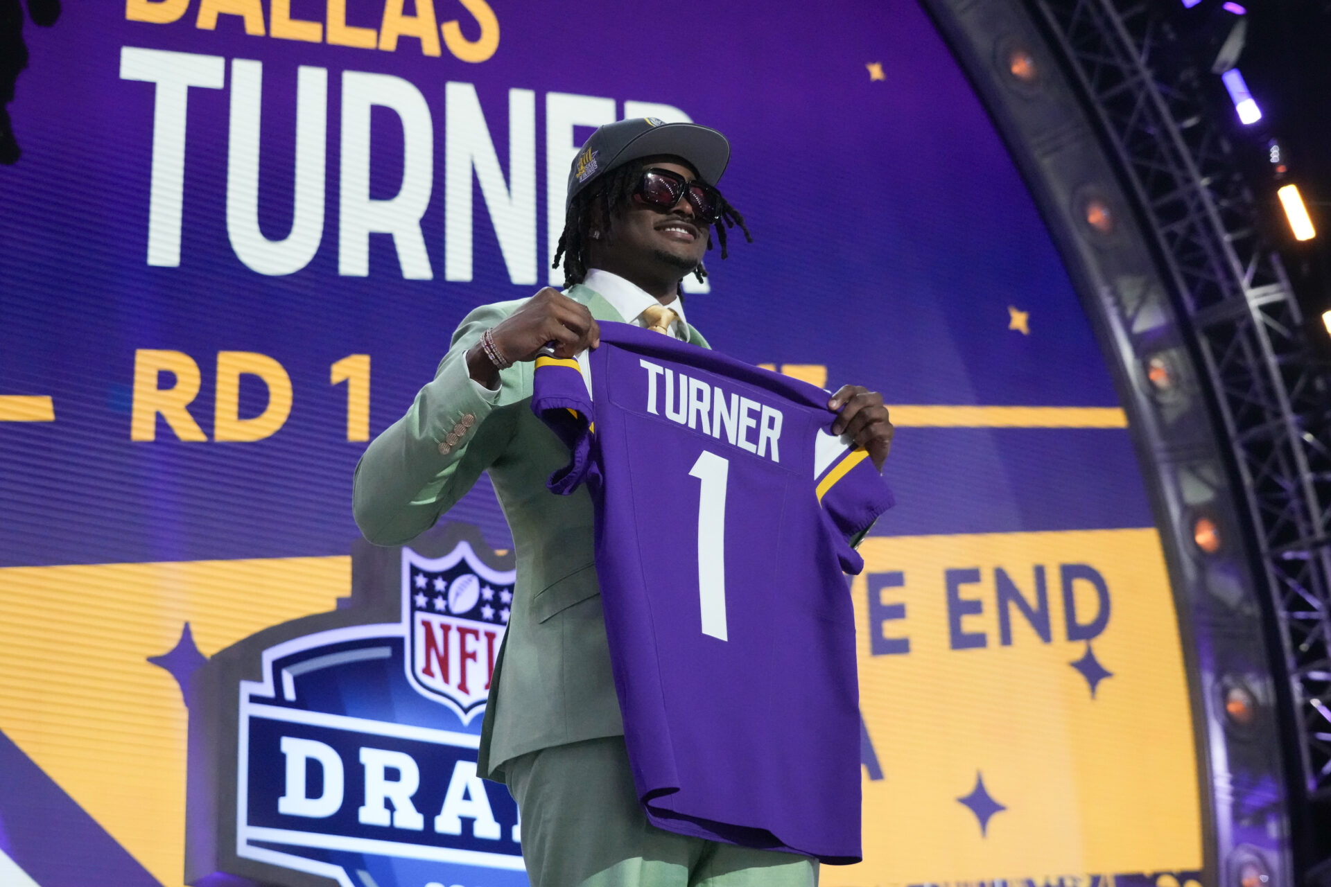 Alabama Crimson Tide linebacker Dallas Turner poses after being selected by the Minnesota Vikings as the No. 17 pick in the first round of the 2024 NFL Draft at Campus Martius Park and Hart Plaza.