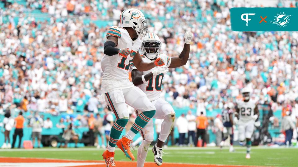 Miami Dolphins wide receiver Jaylen Waddle (17) celebrates his touchdown against the New England Patriots with wide receiver Tyreek Hill (10) during the second half at Hard Rock Stadium.