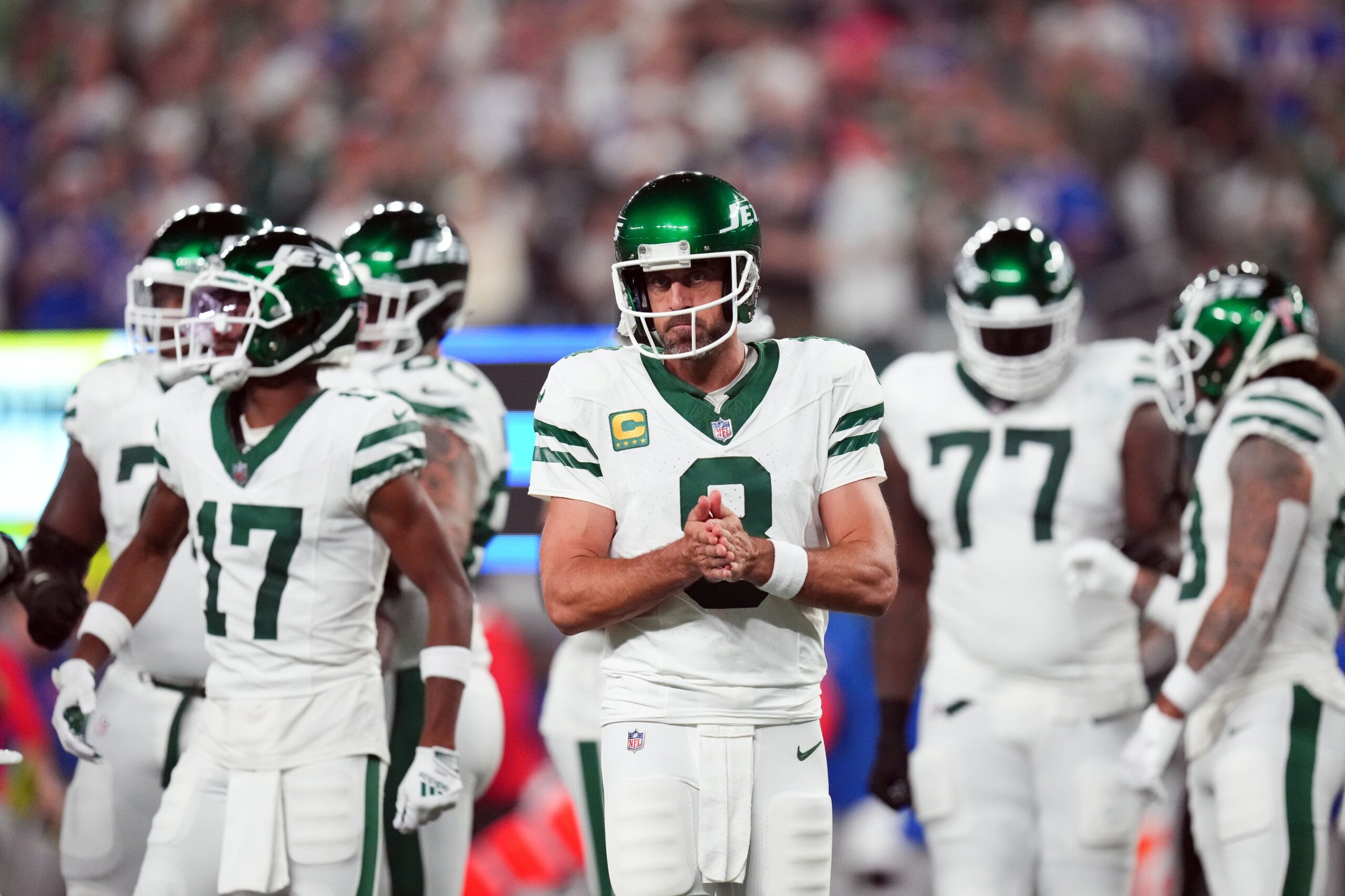 New York Jets quarterback Aaron Rodgers (8) walks out onto the field with the offense to face the Buffalo Bills in the home opener at MetLife Stadium on Monday, Sept. 11, 2023, in East Rutherford.