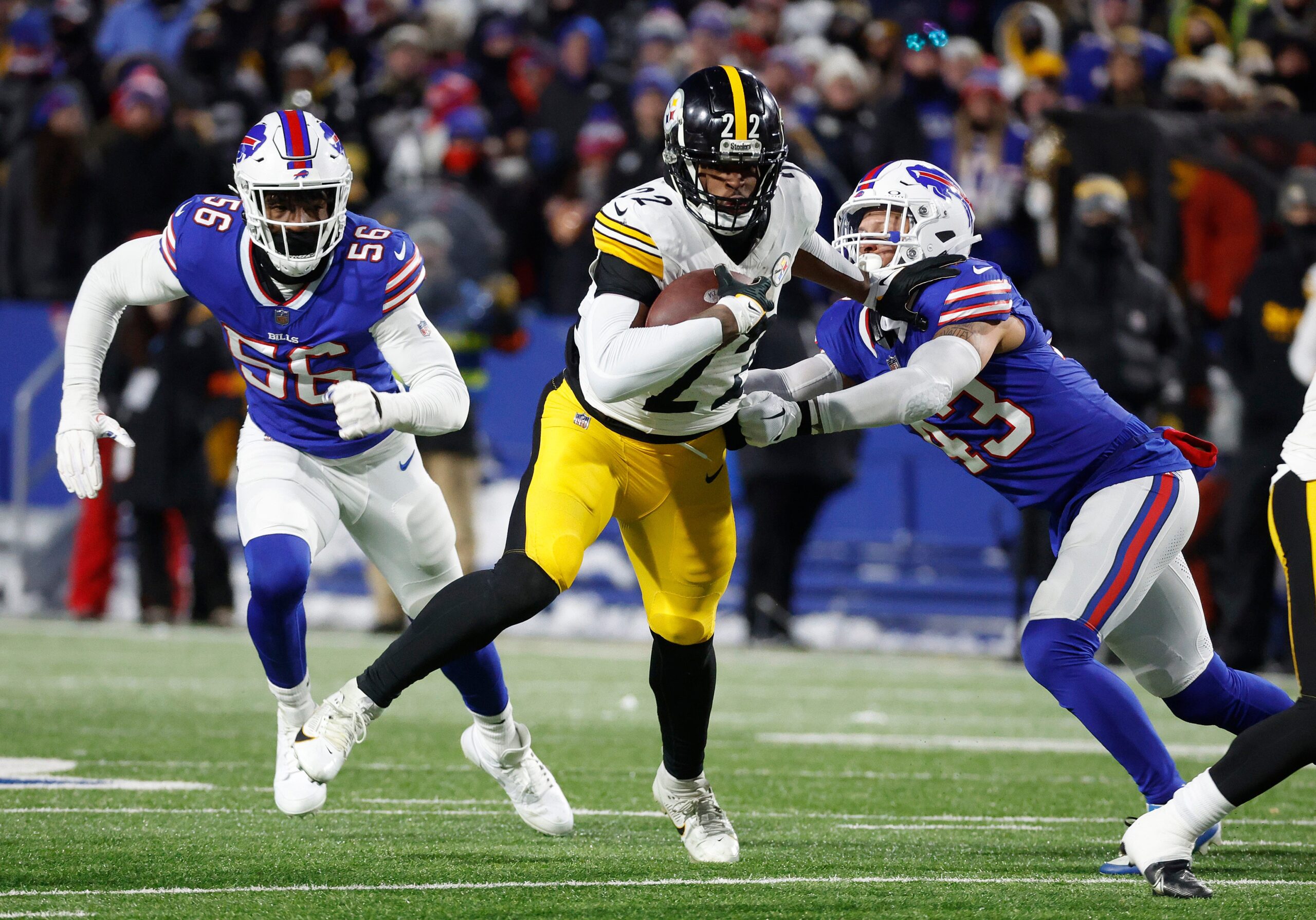 Pittsburgh Steelers running back Najee Harris (22) finds running room against he Bills. Harris ruched for only 37 yards.