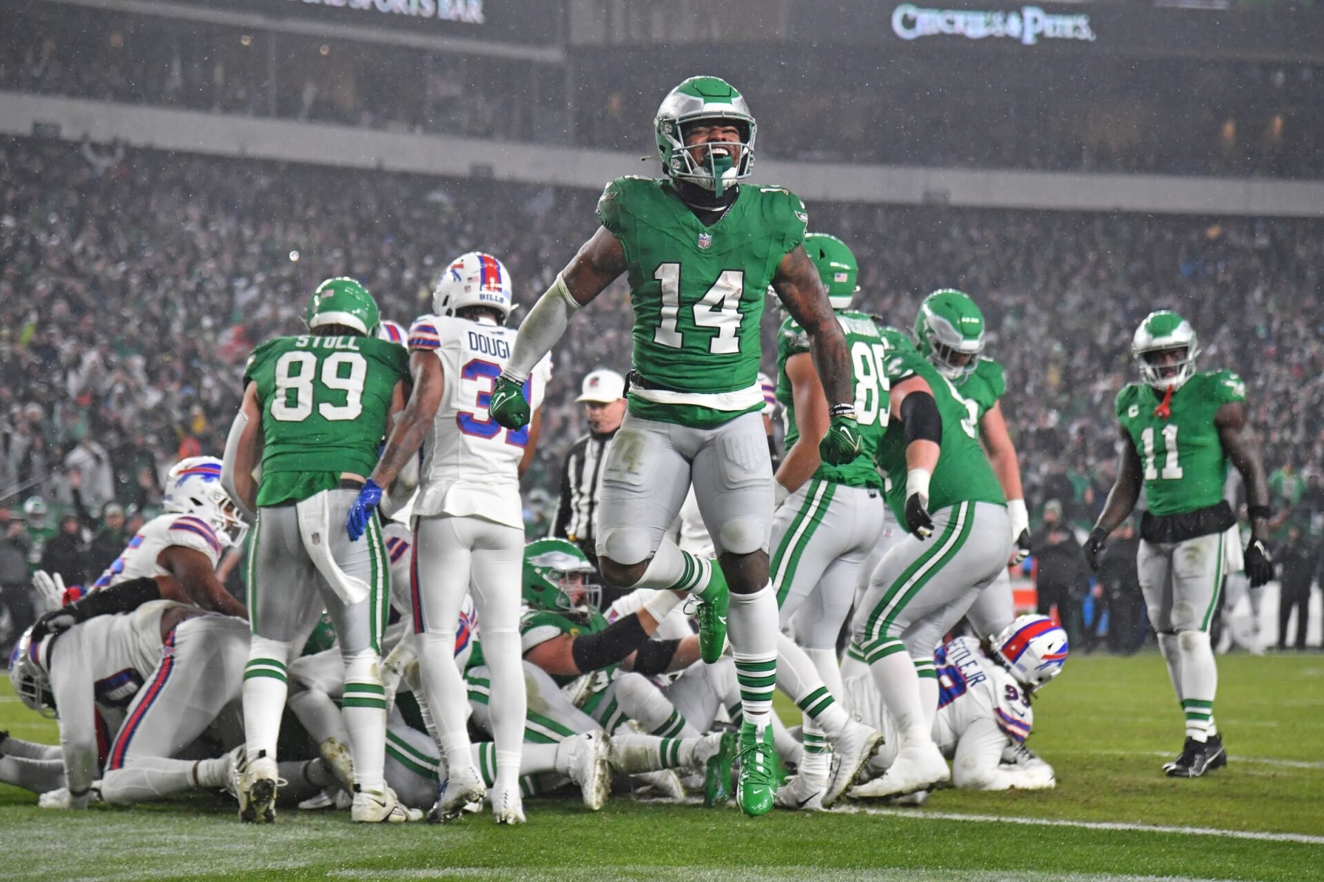 Philadelphia Eagles running back Kenneth Gainwell (14) celebrates touchdown run by quarterback Jalen Hurts (1) (not pictured) against the Buffalo Bills during the first quarter at Lincoln Financial Field. Mandatory Credit: Eric Hartline-USA TODAY Sports