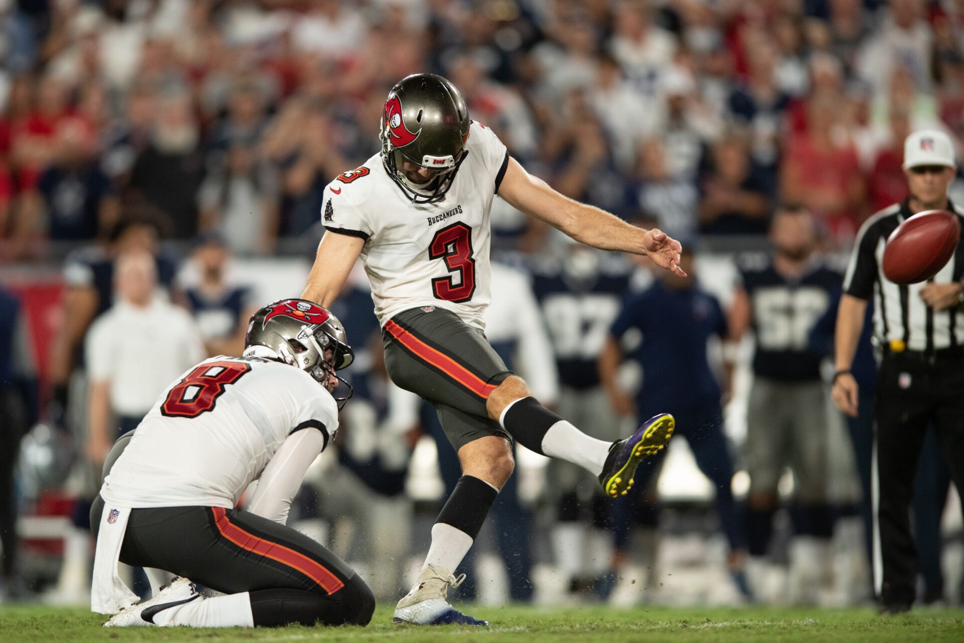 Tampa Bay Buccaneers kicker Ryan Succop (3) kicks the game winning field goal against the Dallas Cowboys in the fourth quarter at Raymond James Stadium.