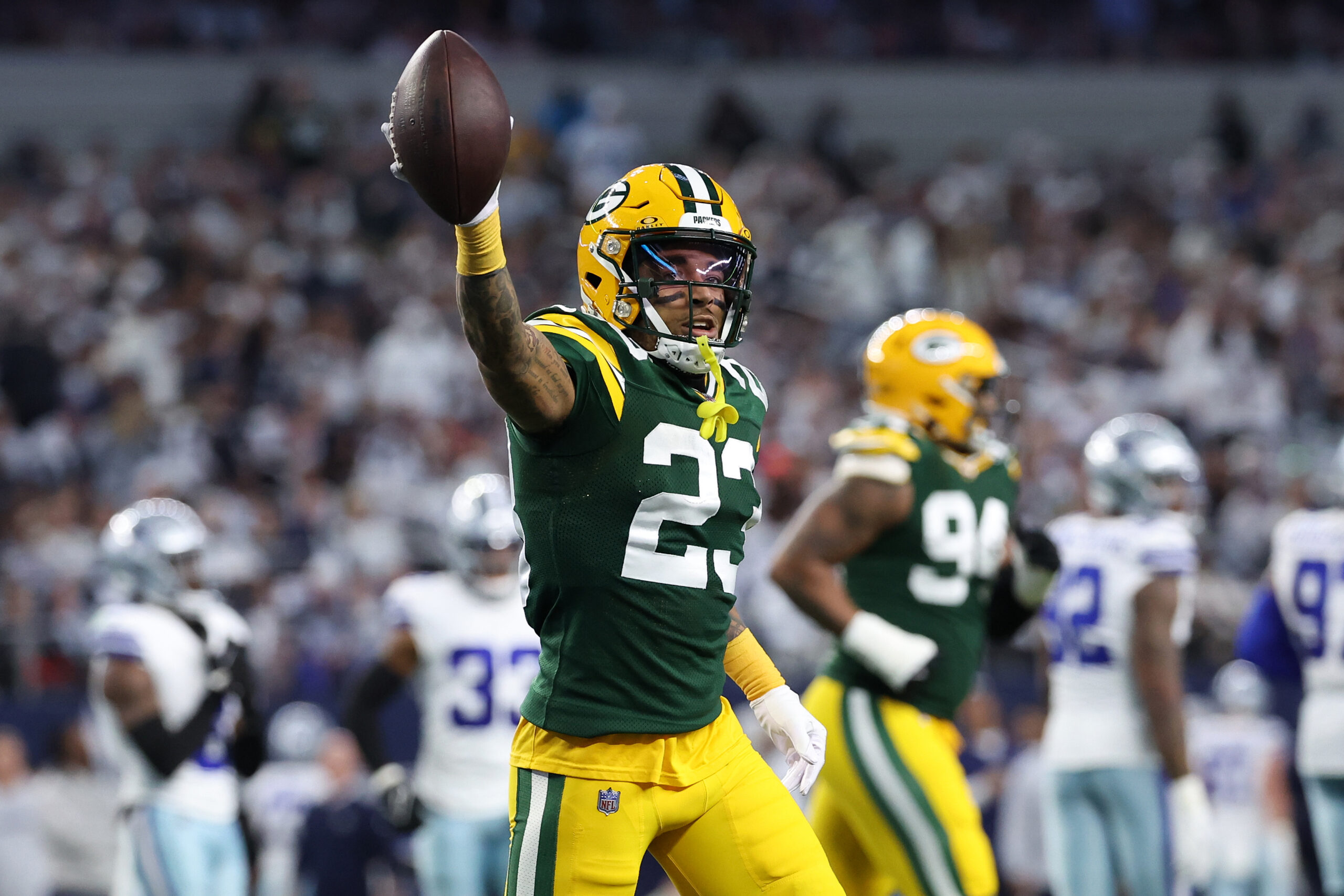 Green Bay Packers cornerback Jaire Alexander (23) reacts after an interception against the Dallas Cowboys in the first half of the 2024 NFC wild card game at AT&T Stadium.