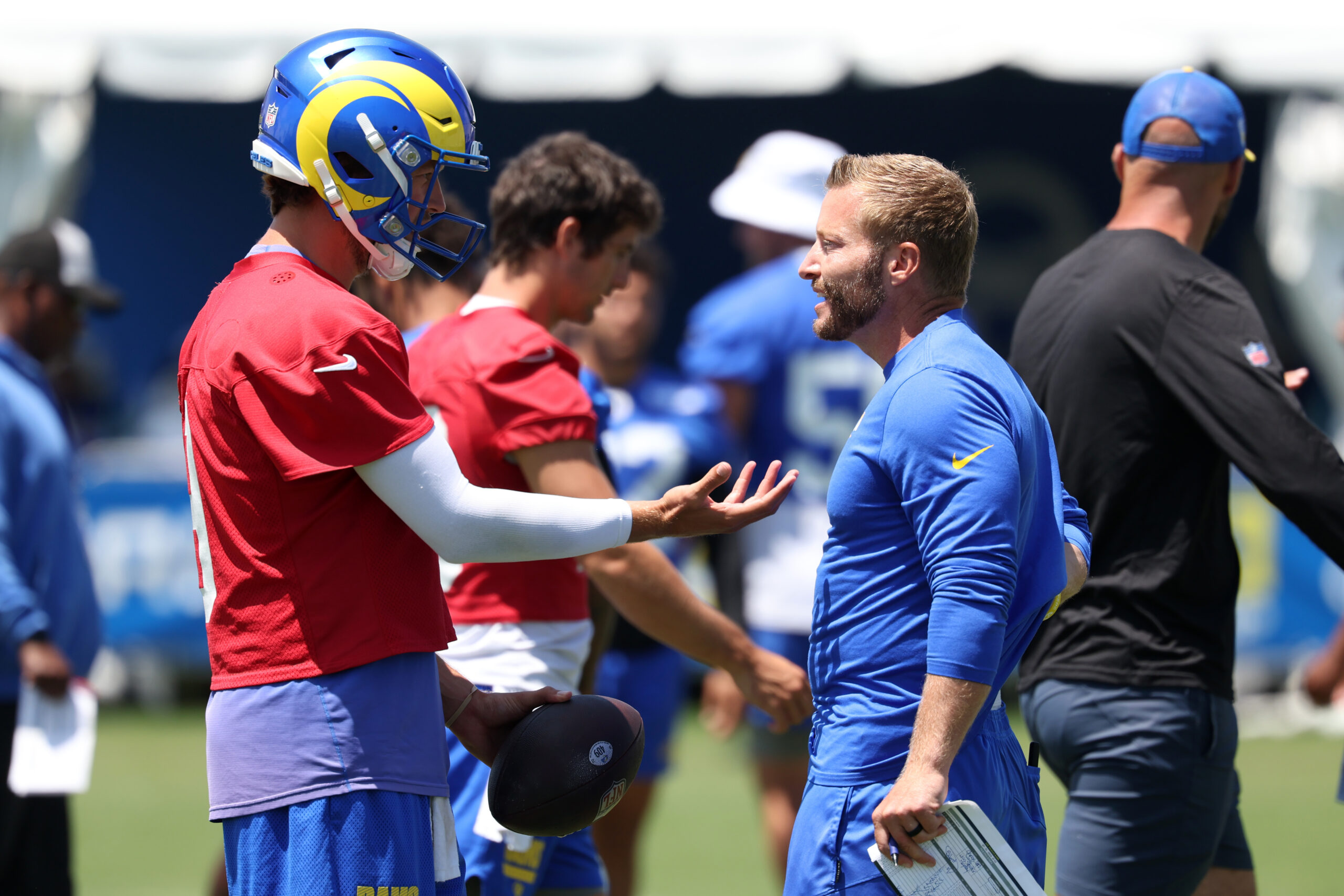 Jul 31, 2024; Los Angeles, CA, USA; Los Angeles Rams quarterback Matthew Stafford (9) and head coach Sean McVay talk during training camp at Loyola Marymount University. Mandatory Credit: Kiyoshi Mio-USA TODAY Sports
